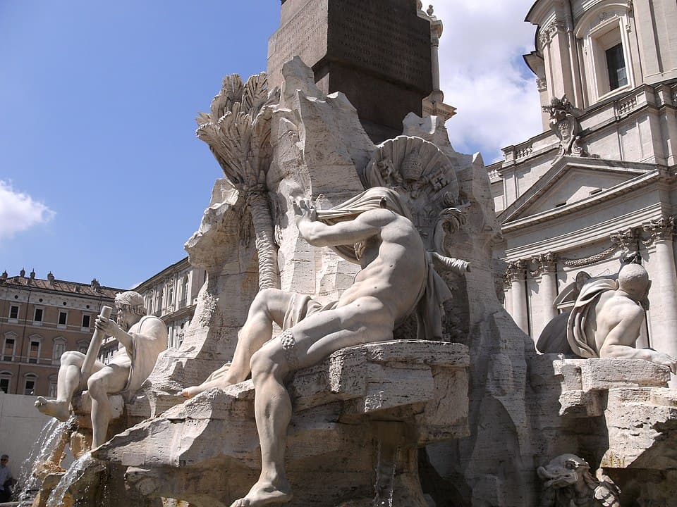 Fontana dei Quattro Fiumi by Bernini in Piazza Navona Rome, the Altar of Water in the Path of Illumination, with the obelisk topped by a dove that points toward Castel Sant'Angelo in Angels and Demons