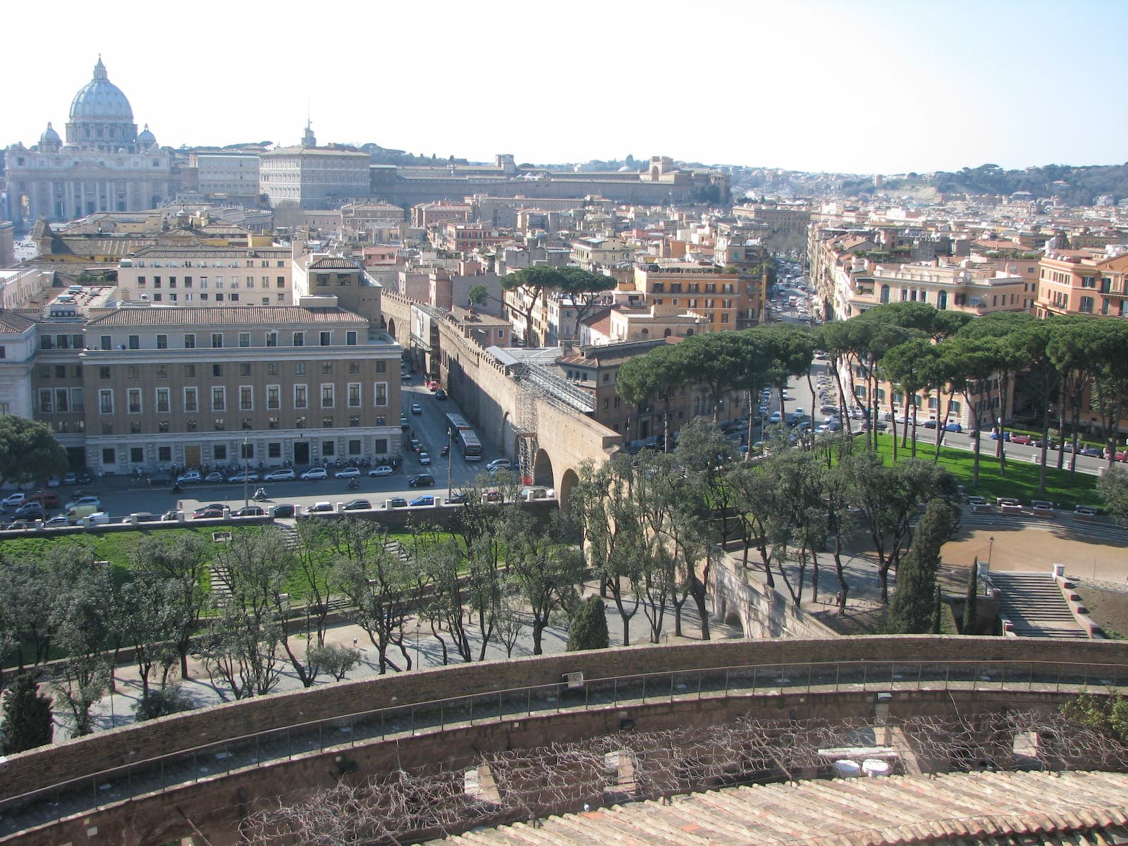 The Passetto di Borgo seen from Castel Sant'Angelo, an 800-metre elevated corridor connecting the castle to the Vatican, with St. Peter's Basilica visible in the background