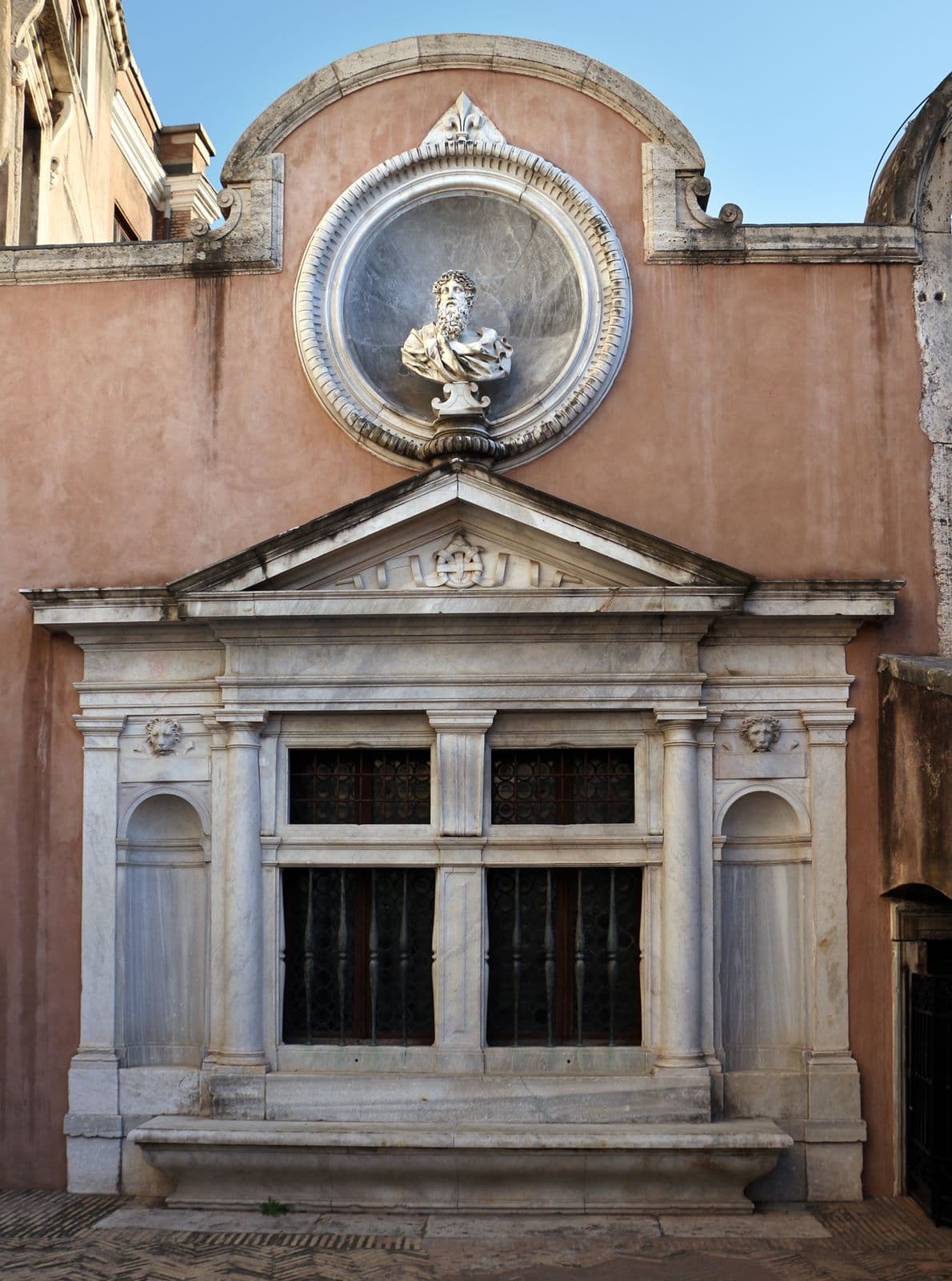 The exterior facade of the Chapel of Saints Cosmas and Damian of Leo X in the Cortile dell'Angelo at Castel Sant'Angelo, designed by Michelangelo Buonarroti in the early sixteenth century
