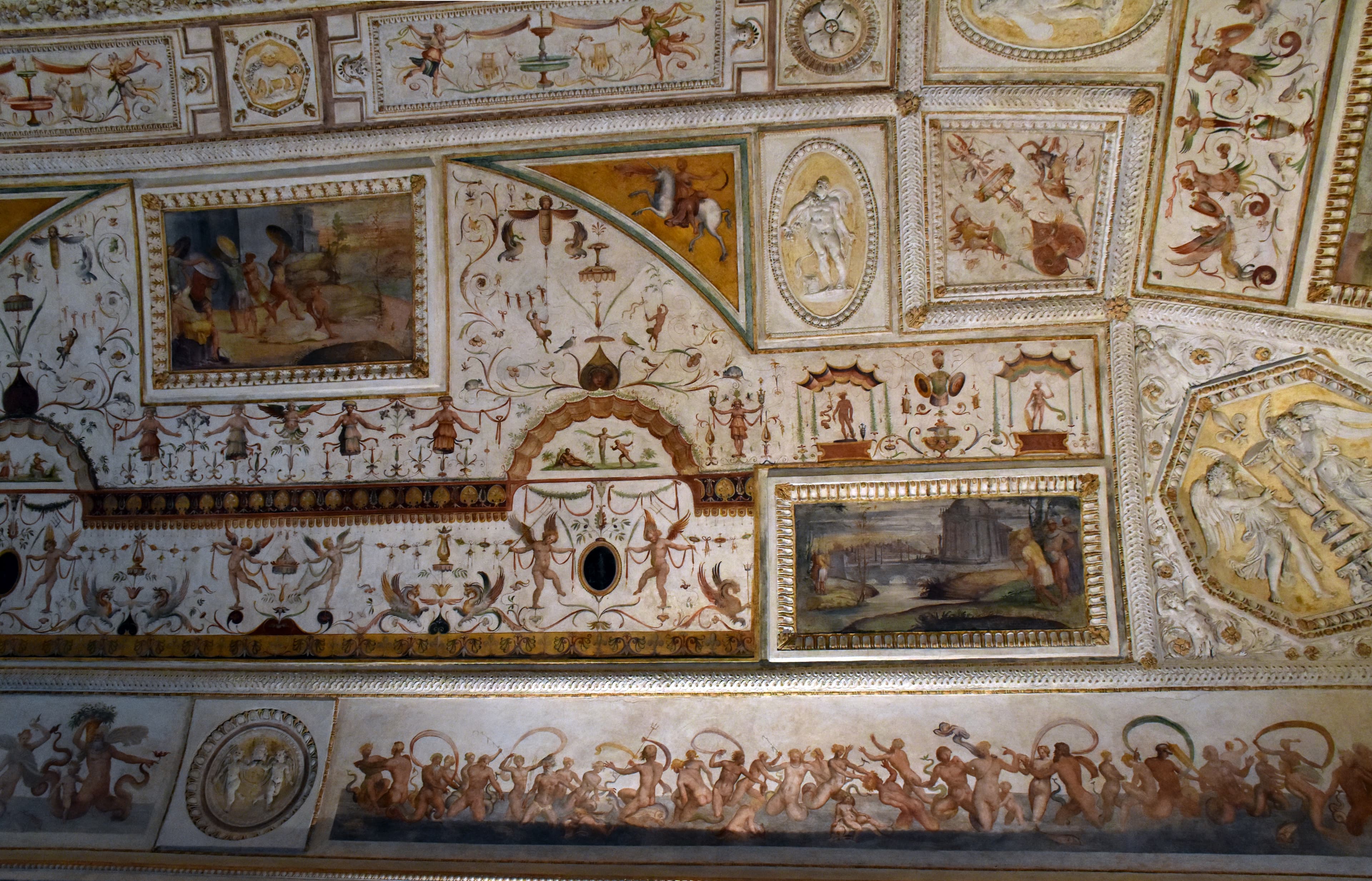 The Sala della Biblioteca at Castel Sant'Angelo, with its monumental vault decorated by Luzio Luzi between 1544 and 1545: grotesque ornament, stucco reliefs, ten scenes of ancient Rome and the Farnese coat of arms at the centre