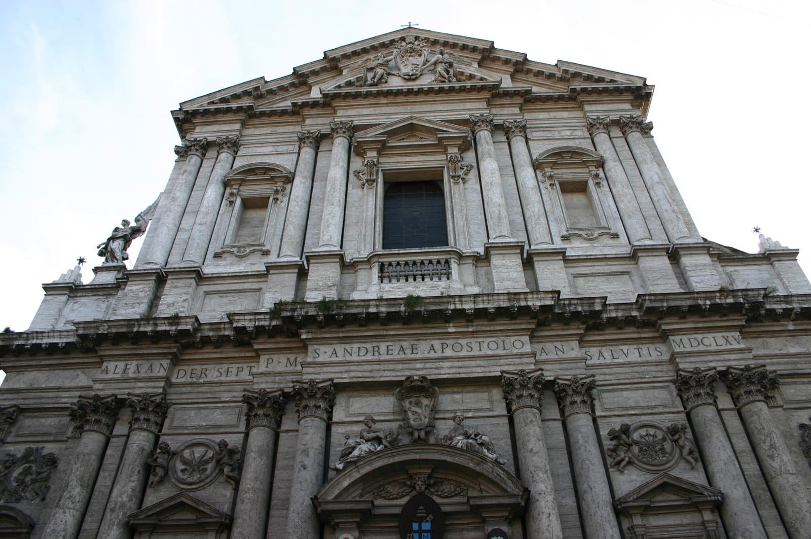 The travertine facade of the church of Sant'Andrea della Valle in Rome, the setting of Act I of Puccini's Tosca, with its characteristic Baroque dome by Carlo Maderno and Carlo Rainaldi